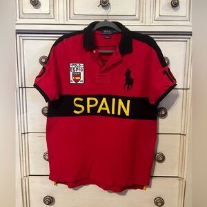 Polo Ralph Lauren Men’s Spain Rugby Polo Shirt red with a black stripe. Size L